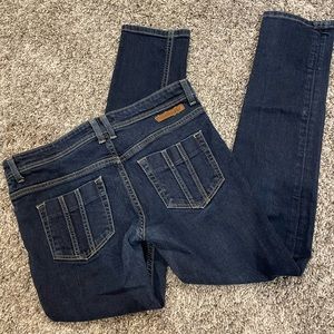 Burberry Girls Jeans. Size: 12Y. Color: Dark wash. Good condition.